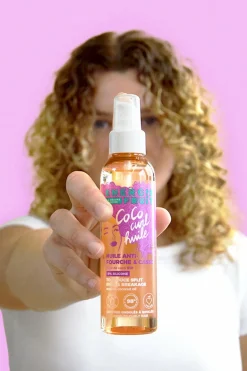 Huile coiffante anti-fourche pour cheveux bouclés