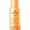 Spray fondant visage et corps haute protection SPF50 Nuxe Sun